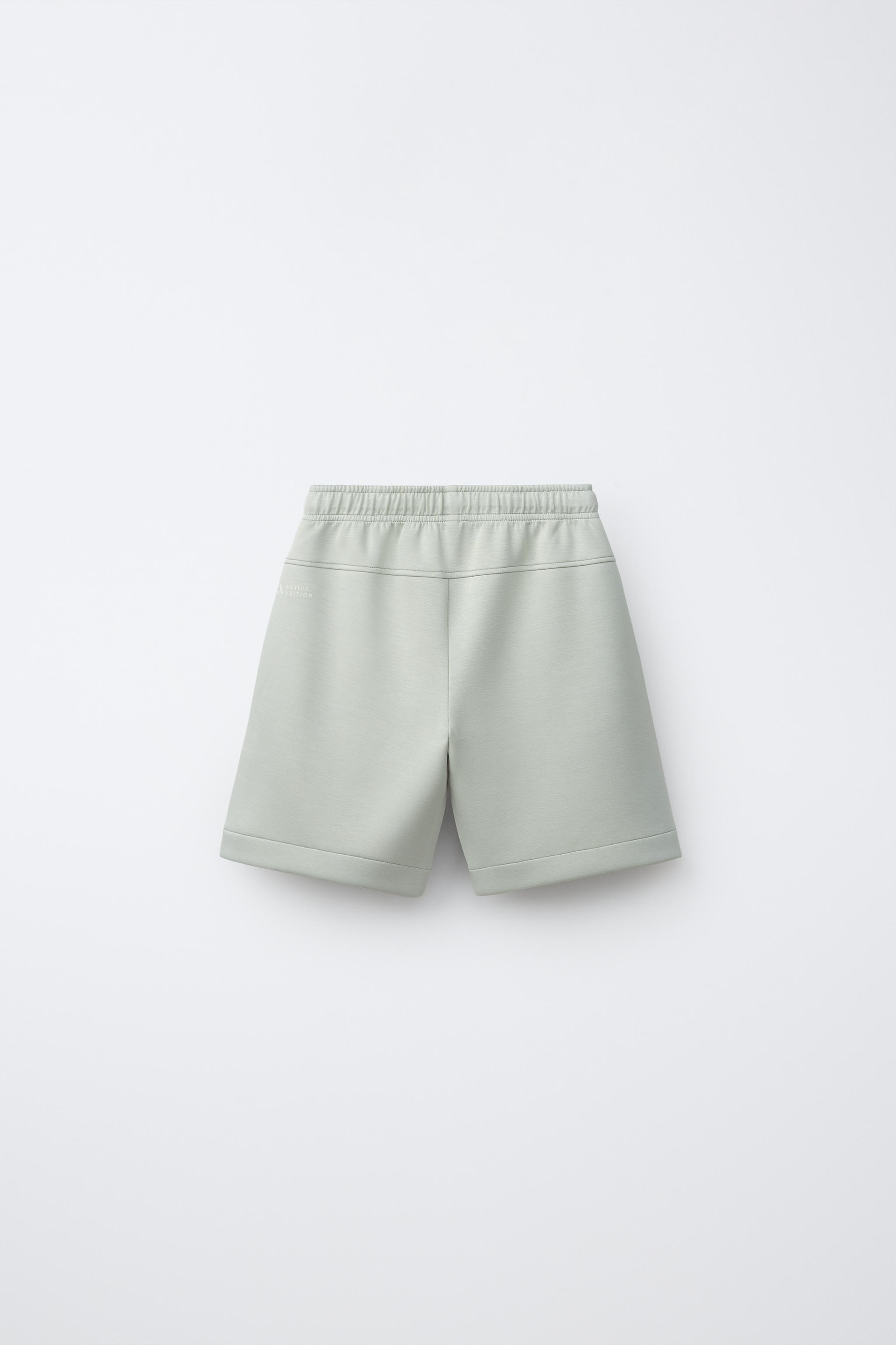 PIPED ATHLETIC SHORTS